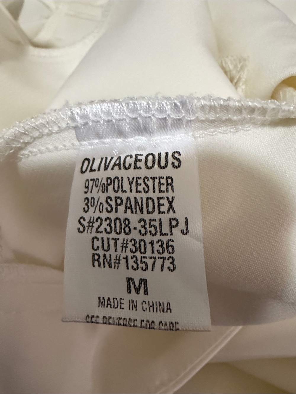 Olivaceous Wide-Leg Cream Trousers with Pleated Front - Picture 6 of 6